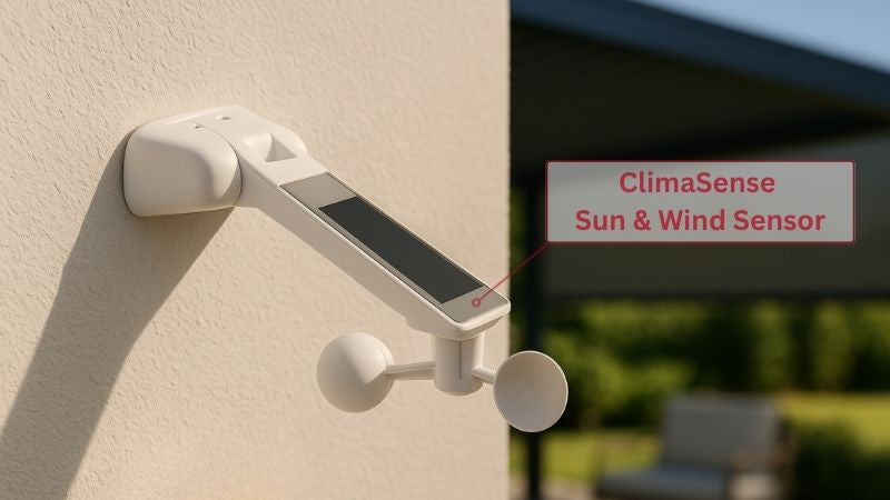 ClimaSense wireless automated weather sensor mounted to an external wall for wind storm defense and sun shade control.