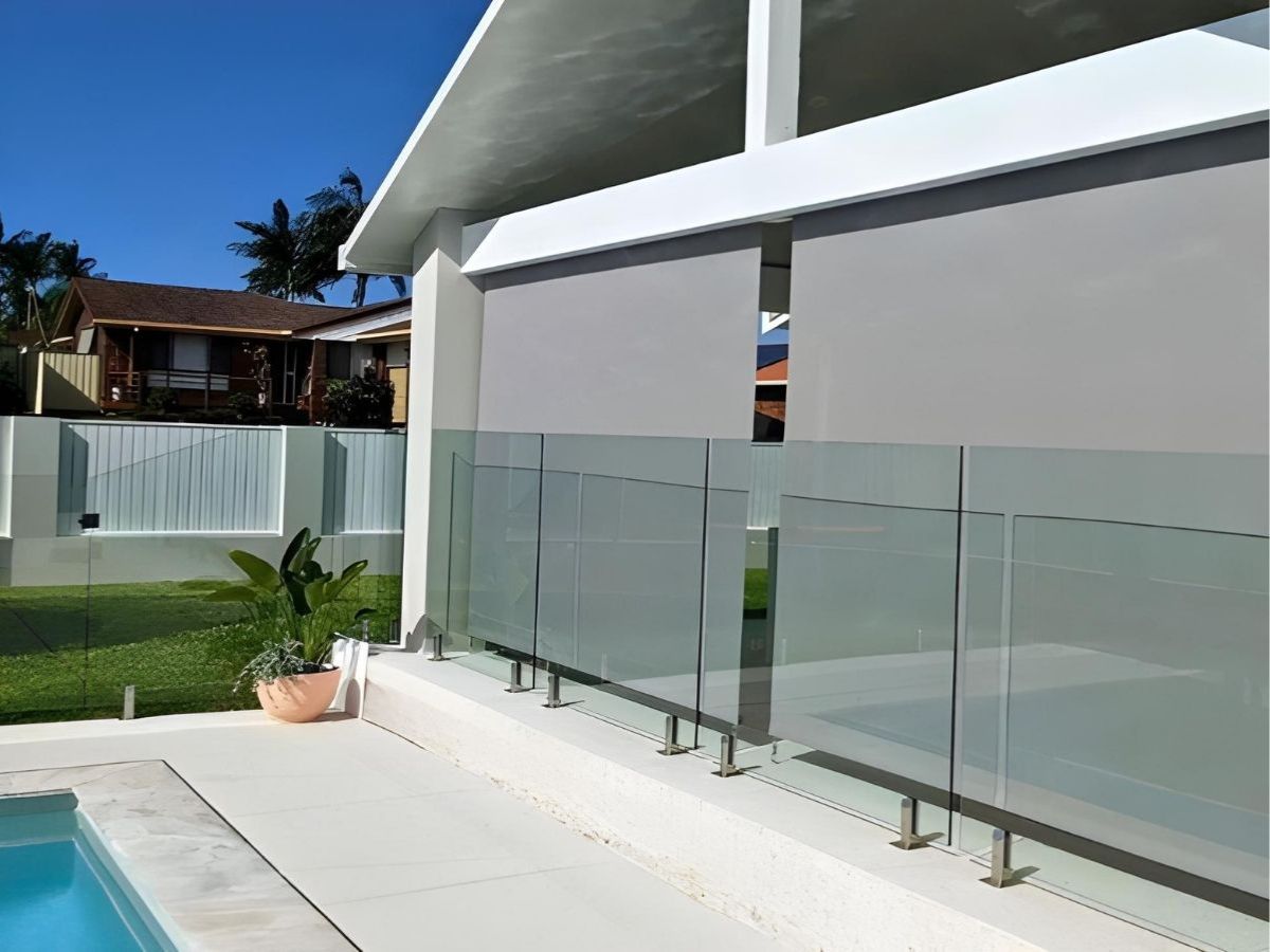 DIY outdoor blinds blocking harsh sun on a patio pergola to keep outdoor space cool and shaded