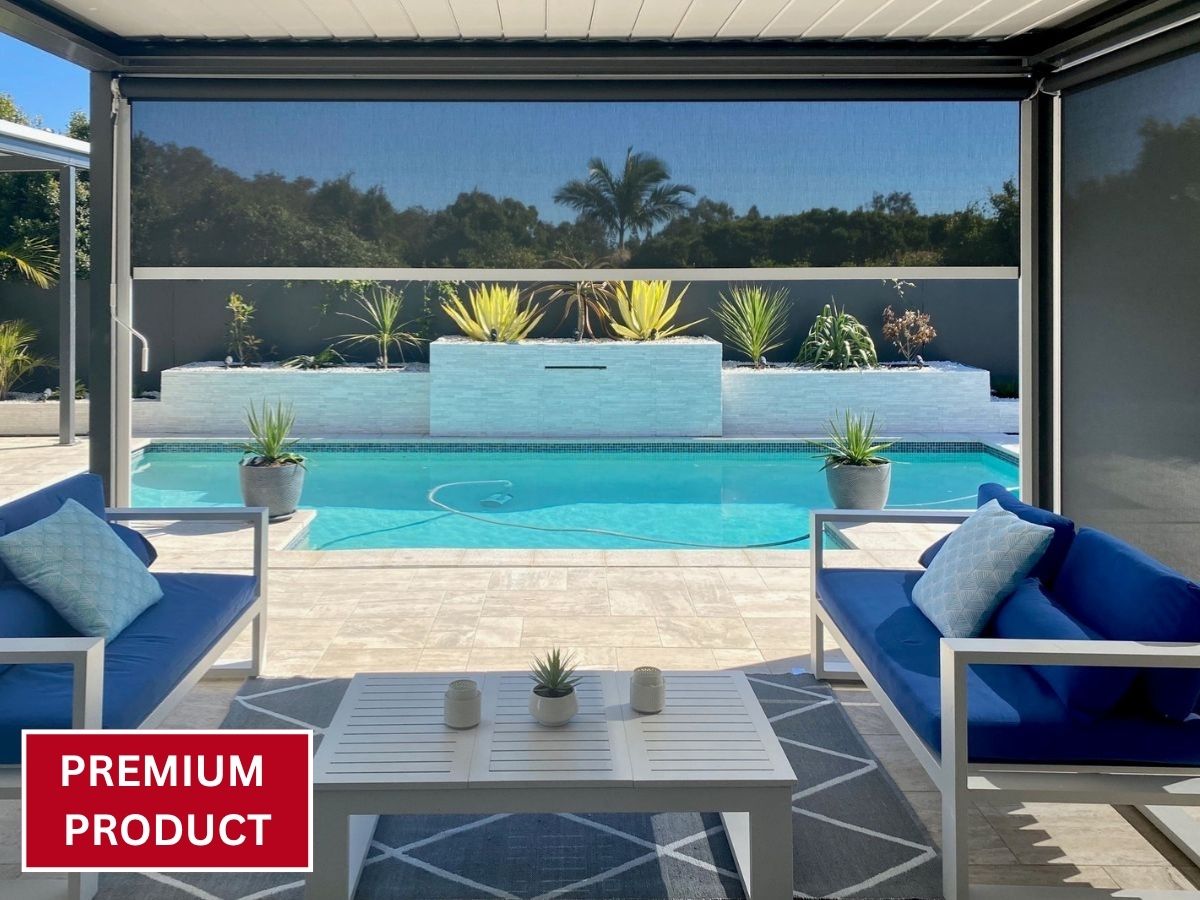 Premium Ziplock outdoor blind installed on a modern patio with poolside seating, providing shade and UV protection.