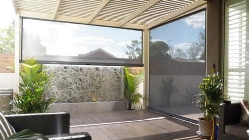 Ziptrak Outdoor Blinds with weather-resistant fabric providing privacy and UV protection for modern patio areas – Ozrite