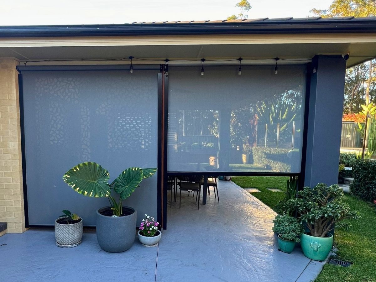 Ozrite outdoor blind on a modern alfresco patio, showing a real installed setup relevant to outdoor blind pricing, privacy and opening size