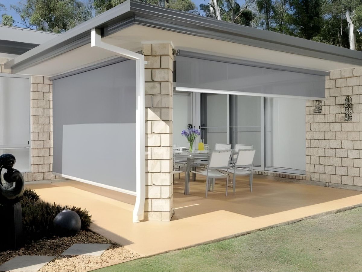 Cable Guided Outdoor Blinds frame providing shade to patio area – Ozrite