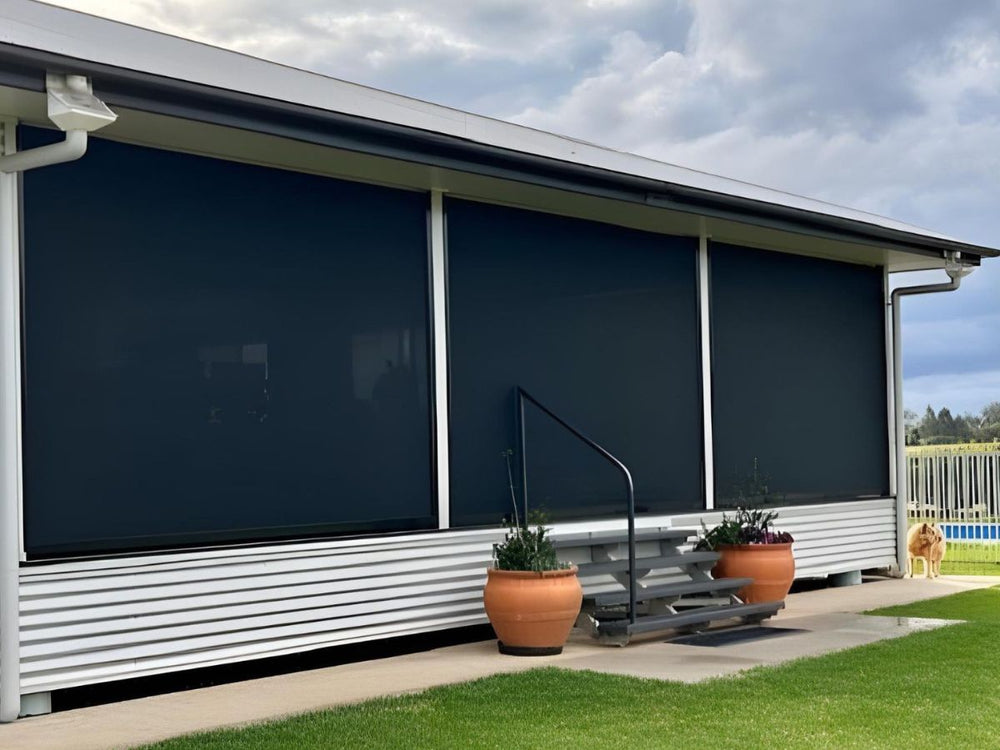 Ebony Ziplock outdoor blind providing sun and wind protection on a modern patio