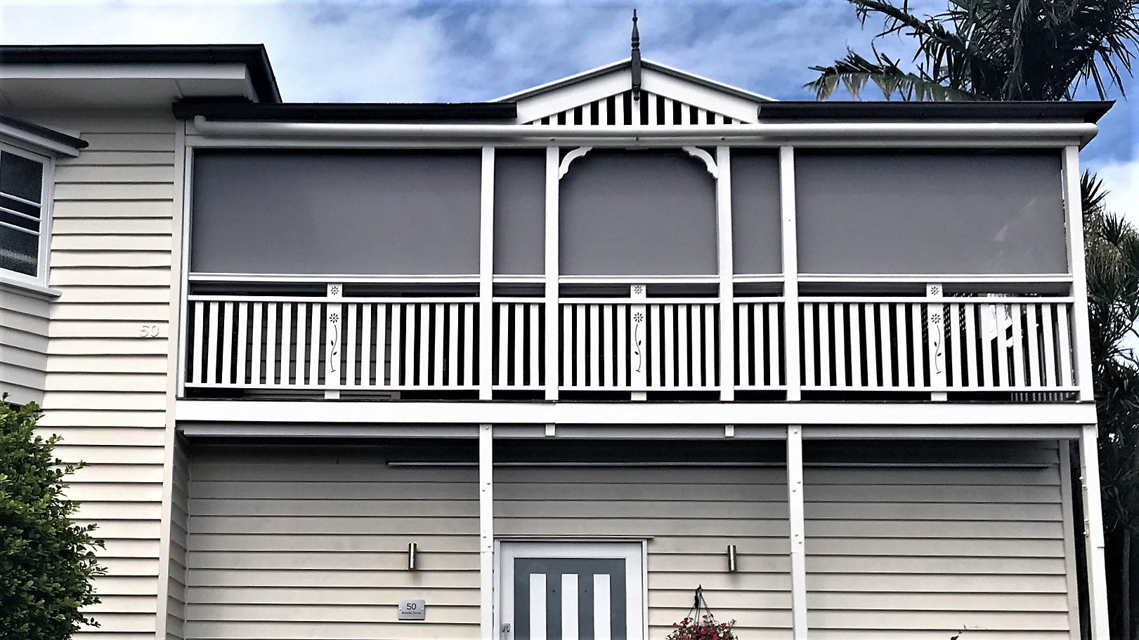 Retractable Outdoor Blind with energy-efficient fabric providing sun protection for upper-floor windows – Ozrite
